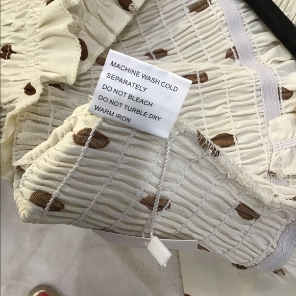 Elastic stretch comfy cream with brown polka dots. - Picture 7 of 7